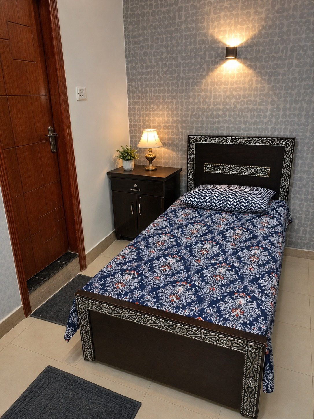 Twin beds with wardrobe and mirror